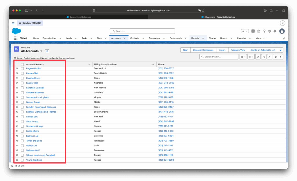 Imported Salesforce account record with related contacts in the destination org